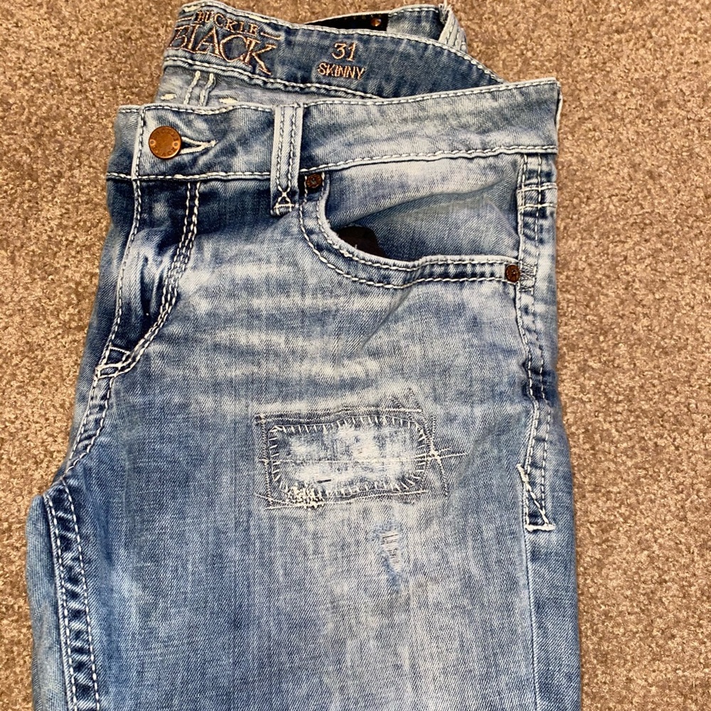 Buckle Skinny Jeans